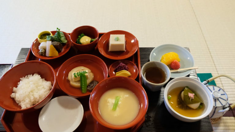 An array of plates with unique vegetarian food served at Shigetsu in Kyoto Japan