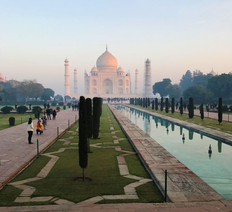 White and Pink Taj Mahal as the sun hits it in the early morning