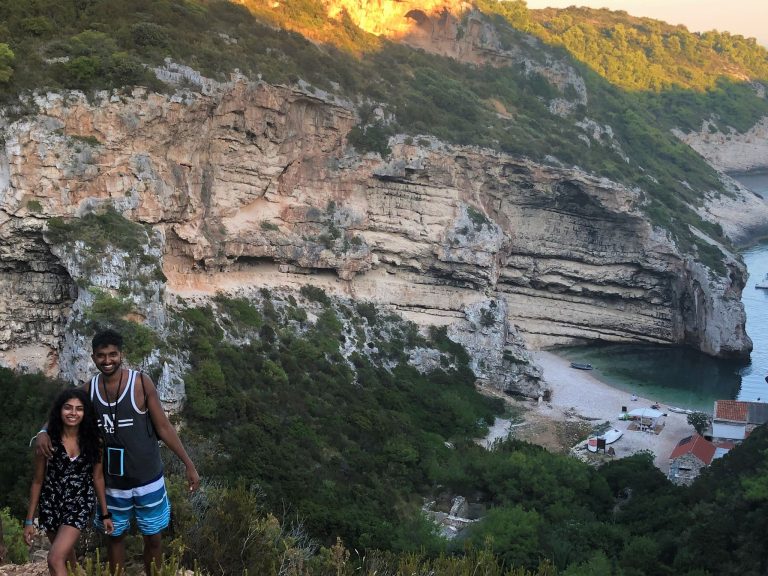 Mountain backdrop at Stiniva Beach with sun setting