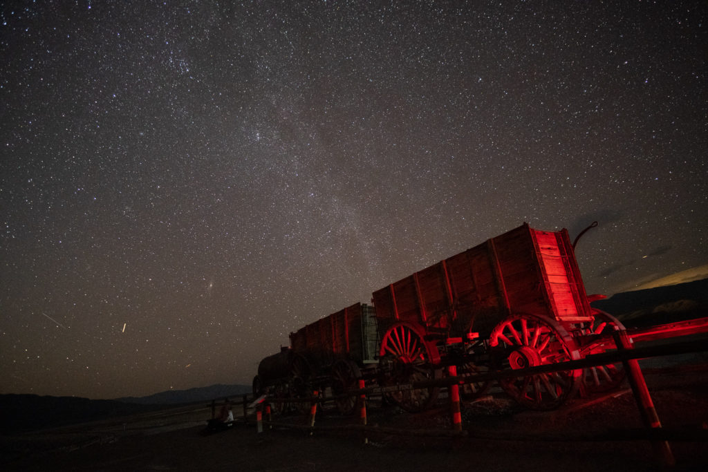 Night Sky at Borax Point at Death Valley with Red wagon