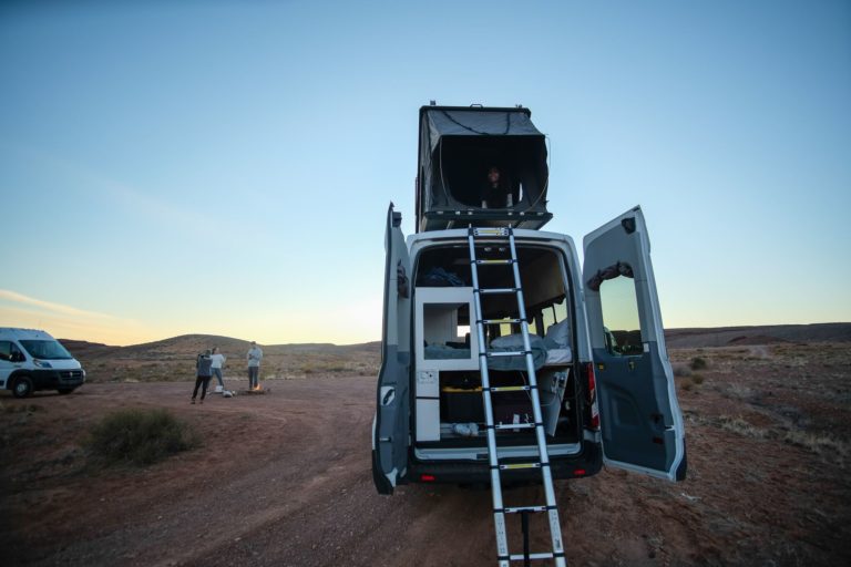 Van parked at Mexican Hat with Tent above