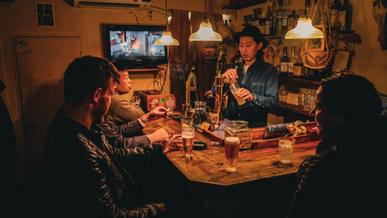 Drinking at a local bar in Golden Gai