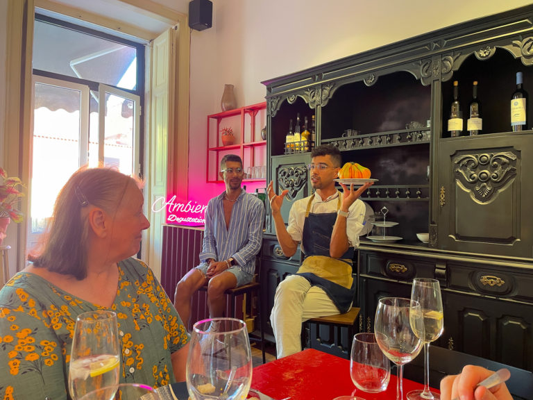 Chef Mateus holding a gourd talking about Portuguese cuisine